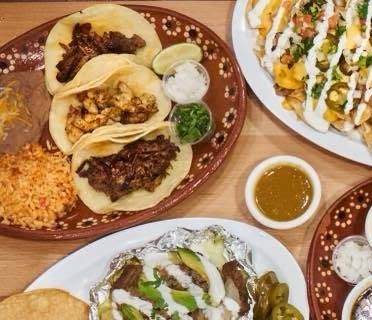 Fresh street tacos and birria plate at Añejo Taqueria